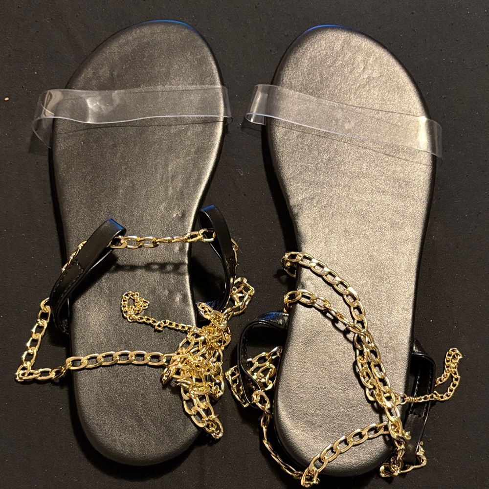 Elegant Black Sandals with Gold Chain Accents